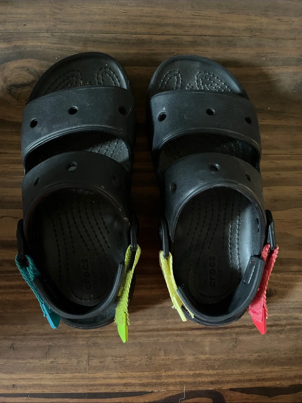 CROCS Black Kids Sandals with Red, Yellow and Teal Straps